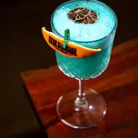 Handcrafted blue mocktail at Meraak