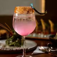 Signature pink mocktail at Meraak